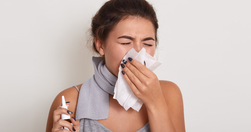 Woman Sneezing | Home Remedies for Sinus