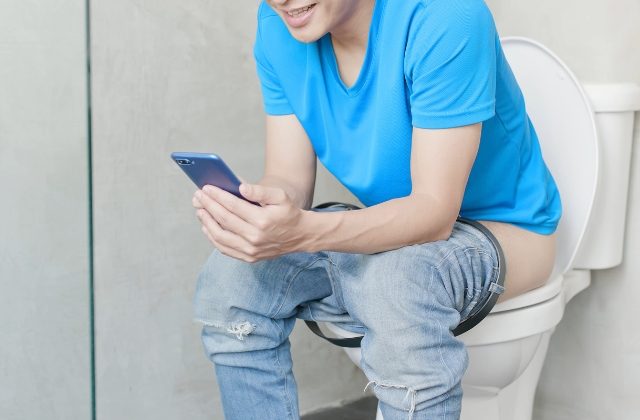Using Phone Toilet