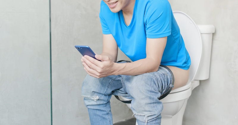 Using Phone Toilet