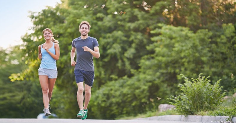 Man and Woman Jogging | Benefits of Regular Exercise