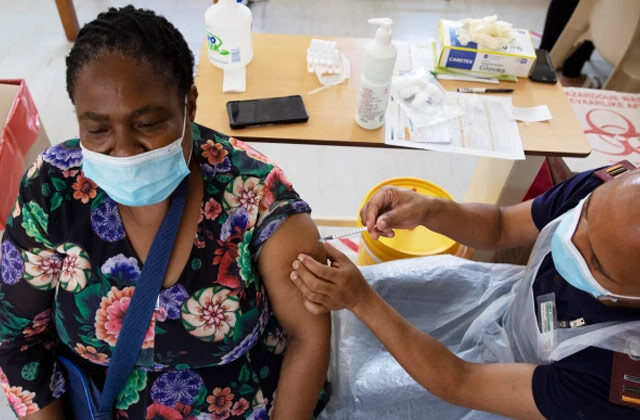 An South African Healthcare Worker Receiving a shot of Johnson & Johnson Covid 19 vaccine | Rise of covid cases in South Africa